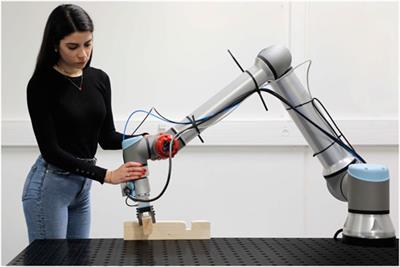 Robotic Assembly of Timber Structures in a Human-Robot Collaboration Setup